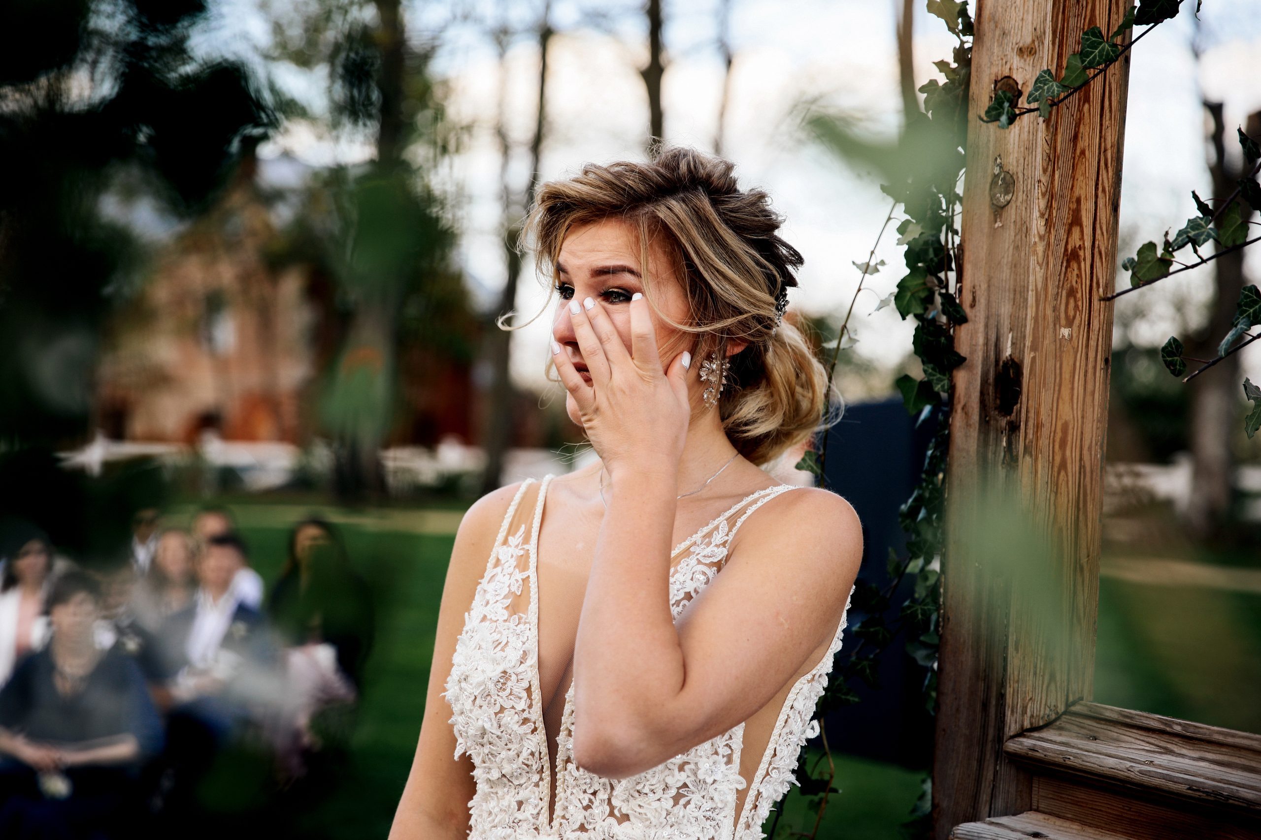 Bride is crying listening the wedding vow from the groom